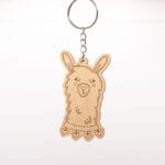 Breloczek z alpaką z serduszkami na szyi