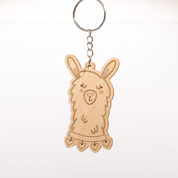 Breloczek z alpaką z serduszkami na szyi